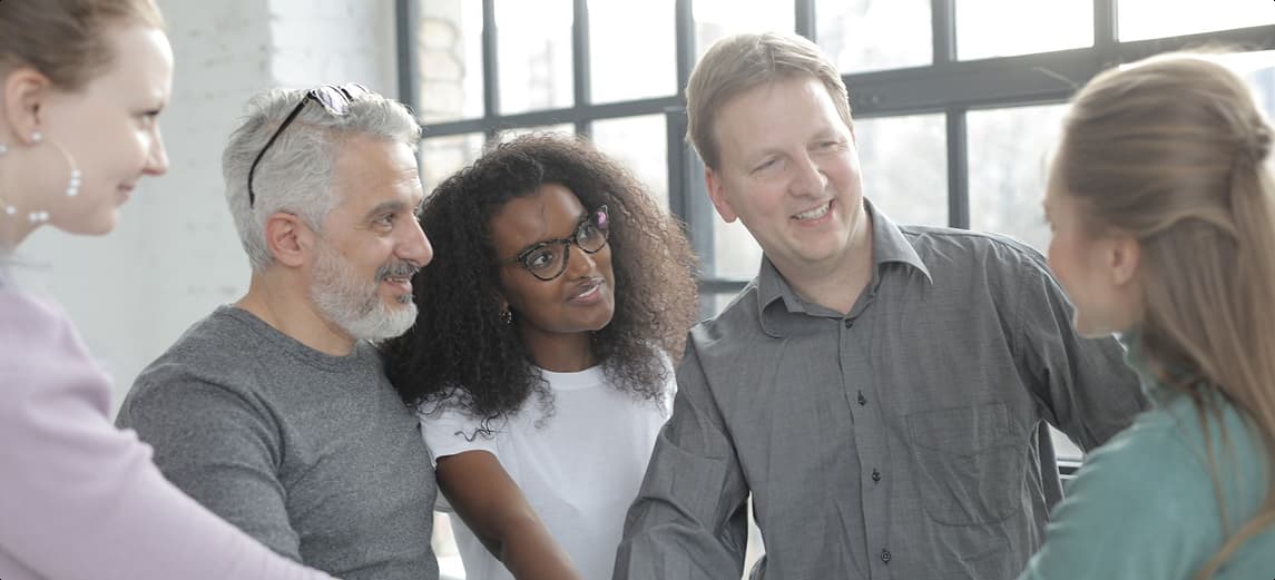 Team im Beratungsgespraech